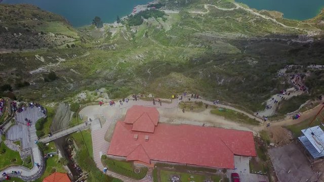 Aerial shot reveals Quilotoa, Ecuador caldera in the Andes Mountains.