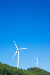 Wind turbine farm power generator on the mountain. 