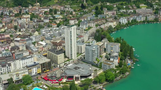 day time flight over montreux city geneva lake famous bay aerial panorama 4k switzerland