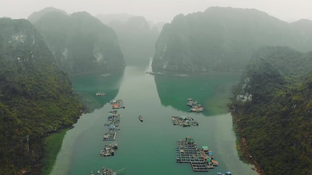 The traditional Cua Van Floating Village in Halong Bay, Vietnam