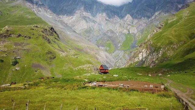 2019 - an aerial approaching a small cabin the high high mountains of the Republic of Georgia.