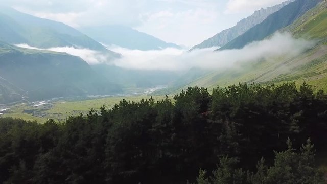 2019 - aerial of a river through the countryside in the Republic of Georgia.