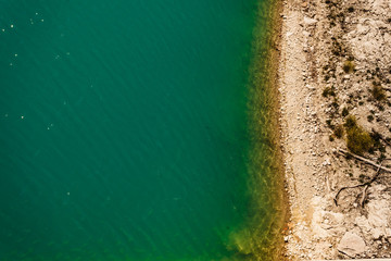 Lake shore, white turquoise water.