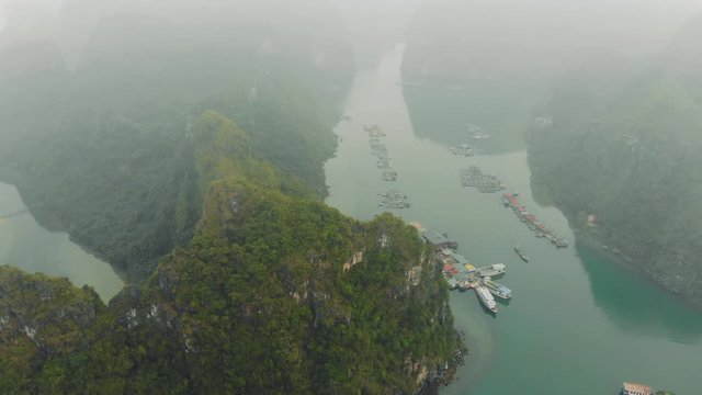 The traditional Cua Van Floating Village in Halong Bay, Vietnam