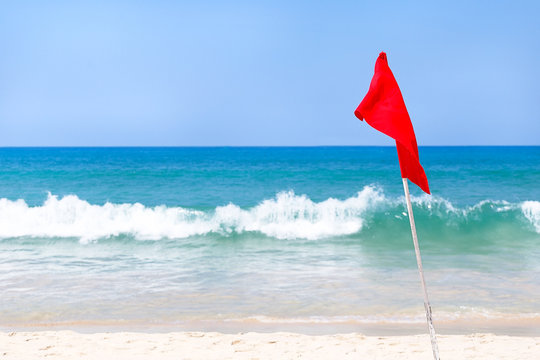 A No Swimming Danger Sign At The Beach.