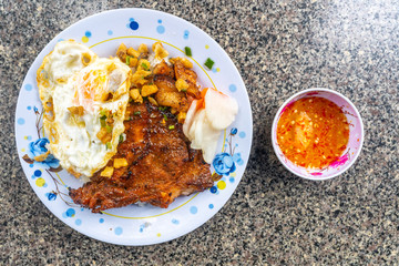 Vietnamese style pork chop rice served with fried egg