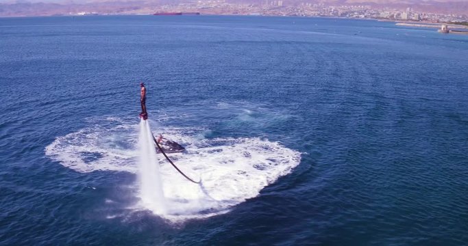 2019 - aerial of a man flyboarding in the Red Sea near Aqaba, Jordan.