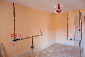 Real renovation of the house: detailed works of masonry and electricity (realization of wall rubs for the introduction of corrugated pipe, wall marking of place of location of switches 