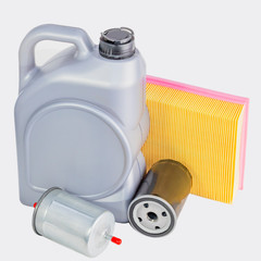 on white background. insulation. canister with engine oil. air filter, oil, fuel. dealership scheduled service.