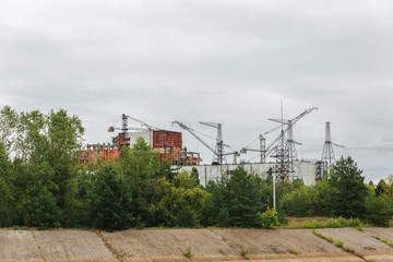 Fototapeta na wymiar protective shelter structure over the nuclear plant in Chernobyl, Ukraine