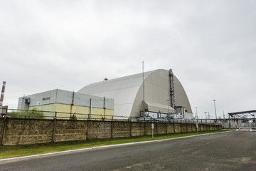 Fototapeta na wymiar protective shelter structure over the nuclear plant in Chernobyl, Ukraine