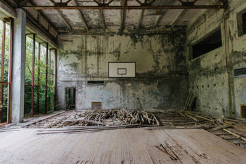 Fototapeta na wymiar abandoned gym in the town of Pripyat, Chernobyl