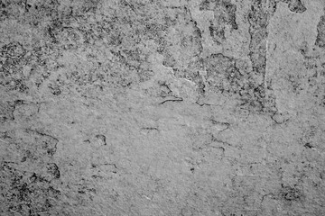 Fototapeta premium Texture of a concrete wall with cracks and scratches which can be used as a background