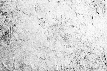 Texture of a concrete wall with cracks and scratches which can be used as a background