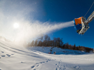 Production of snow with snow making machine at Jaworzyna Mountain. Krynica Resort, Poland.