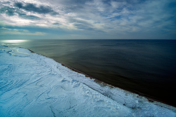 Snowy coast of Baltic sea in winter.