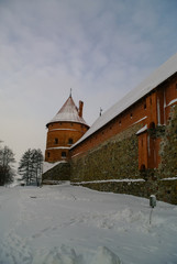 Fototapeta na wymiar Medieval castle in Trakai, winter landscape, Vilnius County, Lithuania