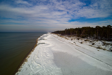 Snowy coast of Baltic sea in winter.