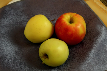 apples on wooden table