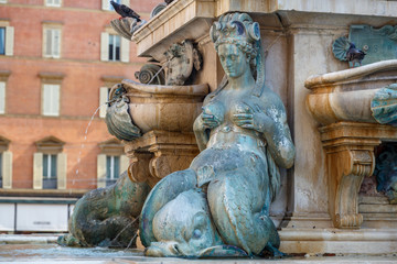 Fototapeta na wymiar Fountain details in the historic centre of Bologna, Italy