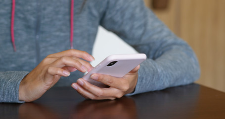 Woman use of smart phone at home