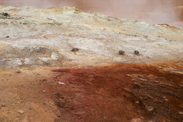 Ground from the geothermal area in Hverir in Iceland. Ground background