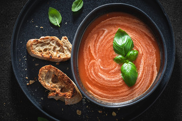 Homemade and creamy tomato soup made of fresh tomatoes