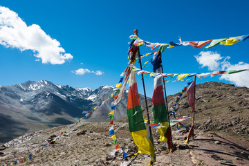 Himachal Pradesh, India - Sep 03 2019 - Tibetan Prayer Flag at Kunzum Pass (Kunzum La) - Chandra Taal (Moon Lake) Trekking course in Lahaul and Spiti, Himachal Pradesh, India.