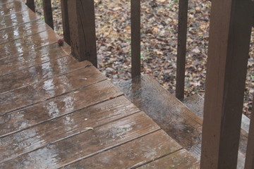 Rain and water on a wooden deck