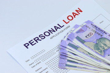 Personal loan application form with rupee note