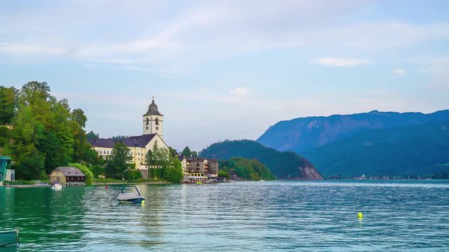 timelapse St. Wolfgang chapel and the village waterfront at Wolfgangsee lake, Austria