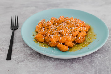pumpkin gnocchi with vegan parmesan and hearbs