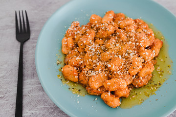 pumpkin gnocchi with vegan parmesan and hearbs