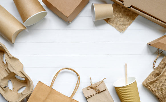 Food paper packaging from environmentally friendly materials on white table