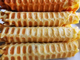 Waffle rolls. Delicious dessert holiday food. Homemade pastries. Fresh raw.