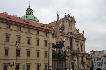 Fototapeta premium The famous tourist area of ​​the Czech capital of Prague is Prague Castle overlooking the Royal Palace in the autumn-winter season.