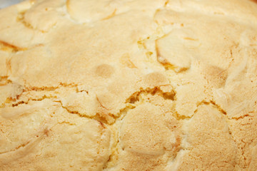 Cooking apple pie. The finished cake is taken out of the oven.
