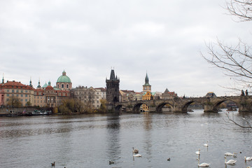  Cityscape of the Czech capital Prague and the Vltava river. View of Charles Bridge and Prague Castle on Christmas Eve.