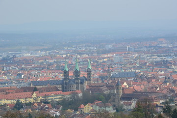 Fototapeta na wymiar Bamberg (Germany). April 2017. Bamberg stands on seven hills in the valley of the Regnitz River, which flows into Main. The city preserved buildings built from 11 to 19 centuries.