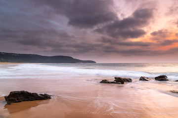 Summer Sunrise with  Smoky Haze and Clouds at the Seaside