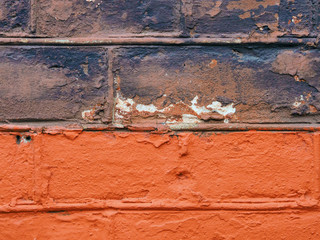 Texture of a brick wall painted with different colors