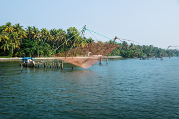 Orang Chinese fisher net along the kollam kottapuram waterway