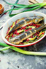 Baked fish with pomegranate