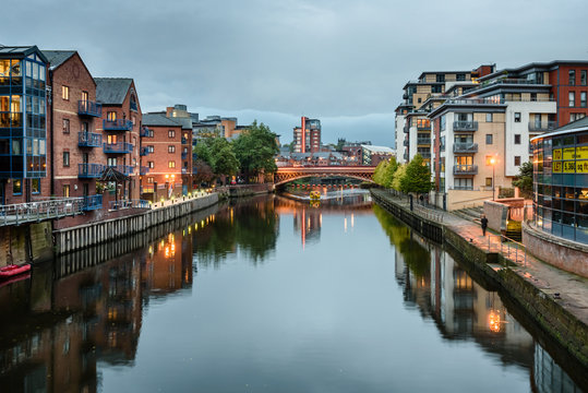 Apartments and other waterfront buildings along the River Aire, Leeds, West Yorkshire, England, UK