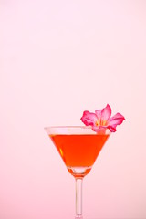 glasses of cocktails and flowers