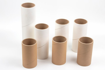 cardboard and paper tubes and pipes on a white background