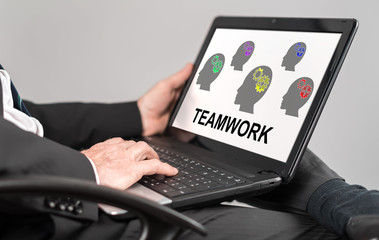 Teamwork concept on a laptop