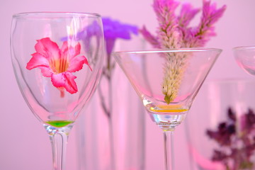 glasses of cocktails and flowers