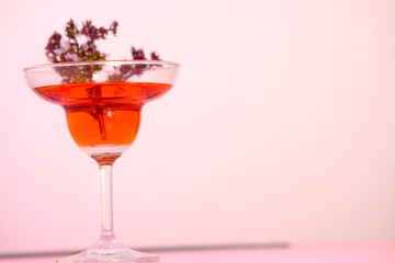 red cocktail with cherry