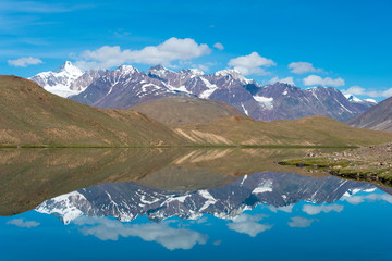 Himachal Pradesh, India - Sep 04 2019 - Chandra Taal (Moon Lake) in Lahaul and Spiti, Himachal Pradesh, India. It is part of Ramsar Convention - Chandertal Wetland.